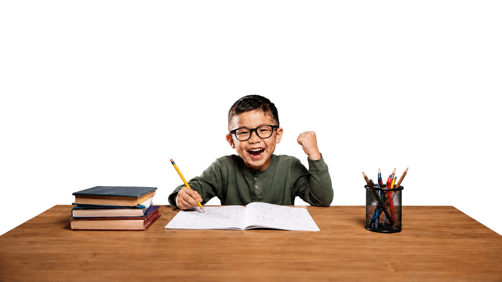 Elementary student working happily at a desk